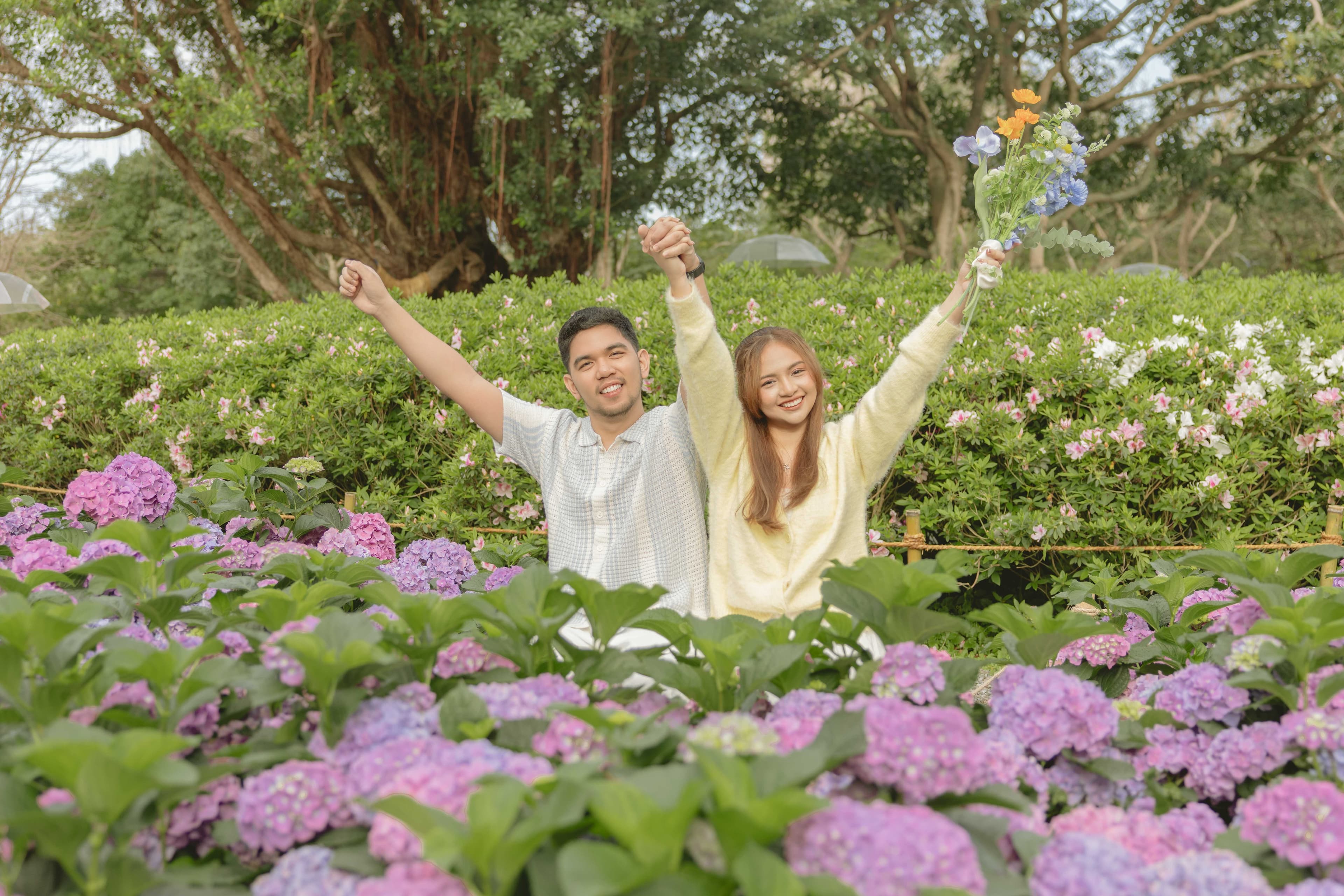Prenup portrait surrounded by greenery